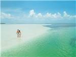 A couple taking a walk in the water nearby at BIG PINE KEY & FLORIDA LOWER KEYS - thumbnail