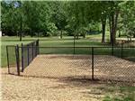 Fenced dog area at Camping World-Campground of Oxford - thumbnail