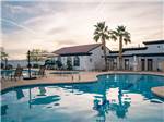 View larger image of Another view of the swimming pool with lounge chairs at VISTA DEL SOL RV RESORT image #10