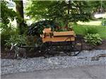 View larger image of A wagon with a flower pot at OMAS FAMILY CAMPGROUND image #6
