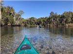 View larger image of A group of kayaks on the river at CHASSAHOWITZKA RIVER CAMPGROUND image #3
