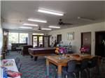 View larger image of Rec room with pool table and games at SUN RESORTS RV PARK image #7