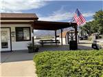 View larger image of A flag flying at the front office at SADDLEBACK RV image #4