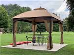 A gazebo with seating at TRIPLE CREEK CAMPGROUND - thumbnail