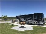 RV with swing and firepit at Bas-St-Laurent Campground - thumbnail