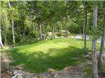 Green grass area at Bas-St-Laurent Campground - thumbnail