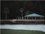 Covered outdoor area with lights at Natalbany Creek Campground & RV Park - thumbnail