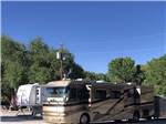 A motorhome and trailer at PICKETTS RV PARK - thumbnail