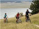 View larger image of Family riding bikes at COLORADO PARKS  WILDLIFE image #4
