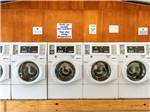 A row of washer machines at ROCKPORT RV RESORT BY RJOURNEY - thumbnail