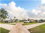 The road between the gravel RV sites at ROCKPORT RV RESORT BY RJOURNEY - thumbnail