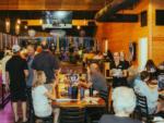 People enjoying the band at the bar and grill - thumbnail