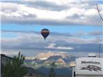 Mountain view with hot air balloon at MOUNTAIN VALLEY RV RESORT - thumbnail
