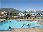 View larger image of Kids swimming in pool at MOUNTAIN VALLEY RV RESORT image #4