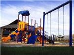 Playground swings at MOUNTAIN VALLEY RV RESORT - thumbnail