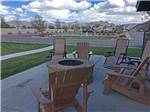 A fire pit with seating at MOUNTAIN VALLEY RV RESORT - thumbnail
