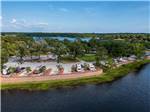 View larger image of An aerial view of the RV sites by the water at TWIN LAKES CAMP RESORT image #1