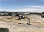 View of vacant and occupied campsites at HOMESTEAD RV PARK - thumbnail