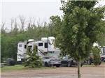 View larger image of A trailer in a RV site at DIAMOND GROVE RV CAMPGROUND image #12