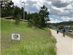 People walking the Mickelson Trail at Black Hills Trailside Park Resort - thumbnail