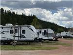 RVs in back-in sites at Black Hills Trailside Park Resort - thumbnail