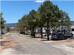 A gravel road in front of the RV sites at LAVALAND RV PARK - thumbnail