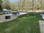 A large RV site with table and fire pit - thumbnail