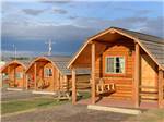 Some of the rustic rental cabins at SHELBY RV PARK AND RESORT - thumbnail