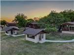 Rental cabins, each with a small pavilion at Hidden Cove Park - thumbnail