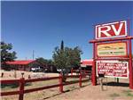 The front entrance sign at WILD WEST RV PARK - thumbnail