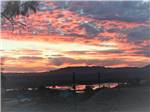 Sunset over the RV park at ROUTE 66 GOLDEN SHORES RV PARK - thumbnail