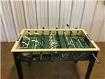 The foosball table in the rec hall at NORTH POINT RV PARK - thumbnail