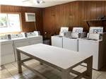 The washers and dryers with a folding table at LAKE EUFAULA CAMPGROUND - thumbnail