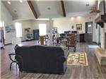 View larger image of Lodge room with fireplace at BY THE LAKE RV PARK image #2