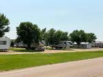 View of the RV sites from a paved road at D & S CAMPGROUND & LODGE - thumbnail