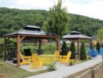 Two gazebos with lounge chairs at LAKE COMPOUNCE CAMPGROUND - thumbnail