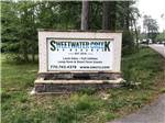 Sign indicating Sweetwater Creek RV Reserve at SWEETWATER CREEK RV RESERVE - thumbnail