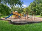 Play structure in sandy area at SWEETWATER CREEK RV RESERVE - thumbnail