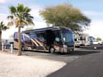 A row of parked RVs - thumbnail