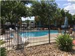 View larger image of The swimming pool area at MISSION CITY RV PARK image #1