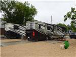 View larger image of A couple of motorhomes in paved sites at MISSION CITY RV PARK image #7