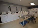 View larger image of The clean laundry room at MISSION CITY RV PARK image #9