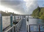 View larger image of Man fishing on dock at FRIENDS LANDING RV PARK image #2