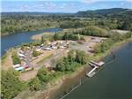 View larger image of Aerial view of campground and surrounding water at FRIENDS LANDING RV PARK image #7