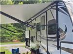 View larger image of A travel trailer in an RV site at PIGEON RIVER CAMPGROUND image #3