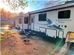View larger image of Fifth wheel parked at campsite at COBBLE HILL CAMPGROUND image #3