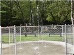 View larger image of The fenced in fountain at MAPLEWOOD ACRES RV PARK image #2