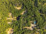 Aerial shot of woods and sites at Spacious Skies Seven Maples - thumbnail