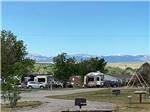 Gravel RV sites with BBQs at CHOTEAU MOUNTAIN VIEW RV CAMPGROUND - thumbnail