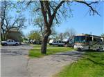 RVs and trailers at campground at RIVERSIDE PARK RV - thumbnail